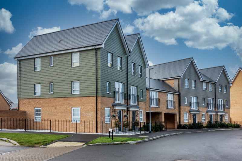 Newbuild properties in Leeds, pictured on a sunny day.